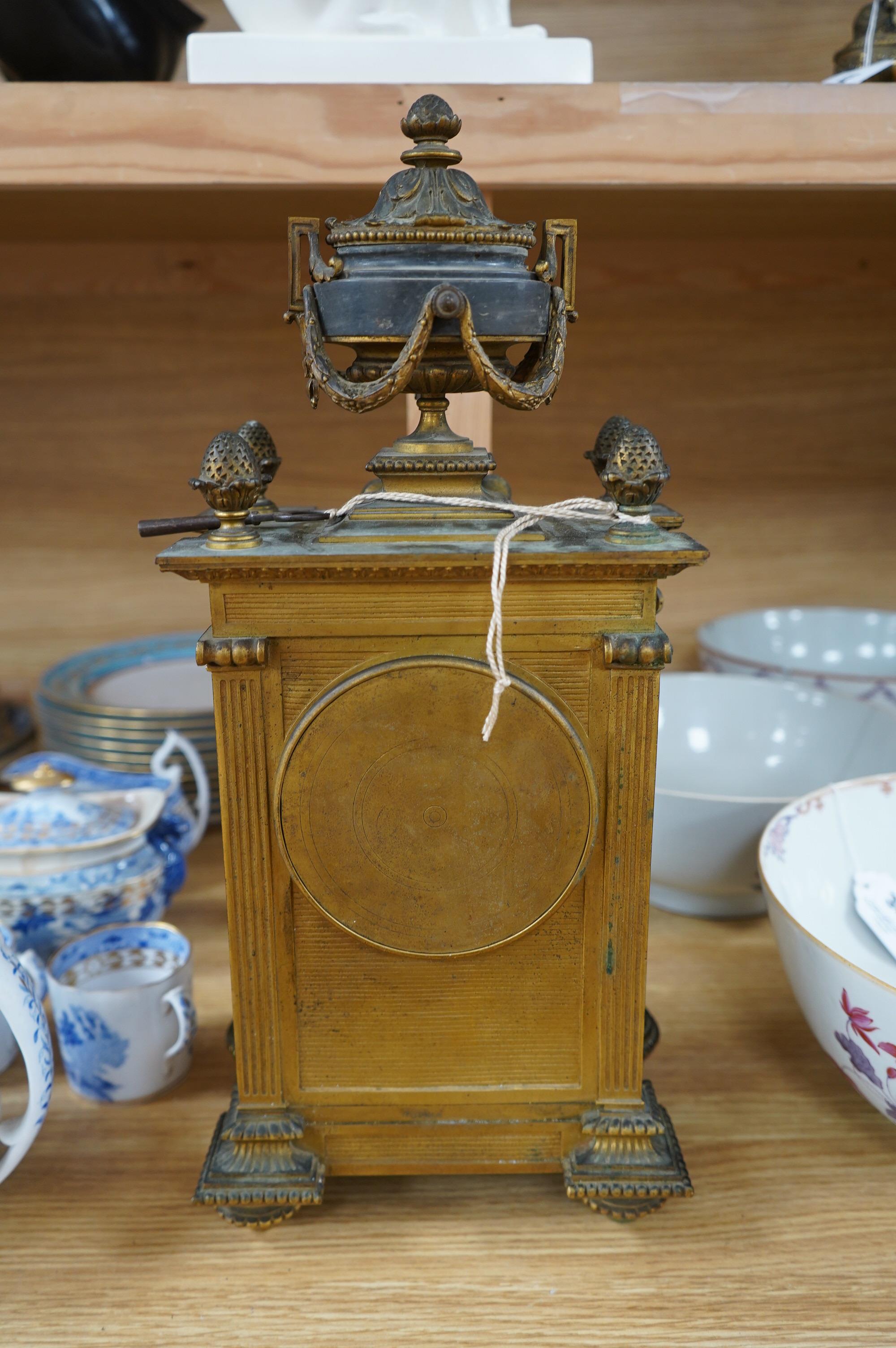 A 19th century French ormolu and marble mantel clock, striking on bell, with key, 44cm high. Condition - fair to good, untested